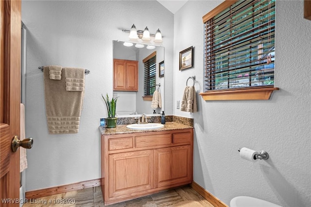 95147 S 4507th Rd, Vian, OK 74962 - bathroom featuring vanity and baseboards