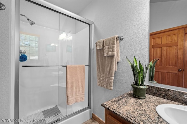 95147 S 4507th Rd, Vian, OK 74962 - full bath with a textured wall, vanity, and a stall shower