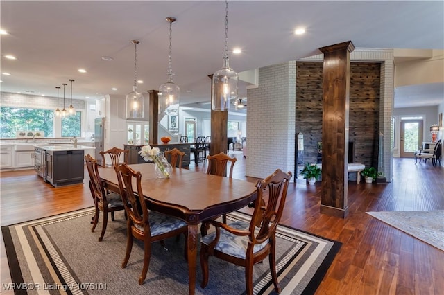 4001 Spring Mountain Rd, Fort Smith, AR 72916 - dining area featuring a wealth of natural light, wood-type flooring, and brick wall