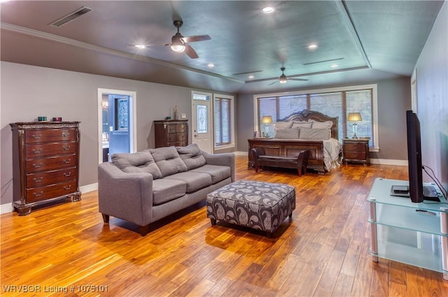 4001 Spring Mountain Rd, Fort Smith, AR 72916 - bedroom featuring a raised ceiling, ensuite bath, ceiling fan, and wood-type flooring