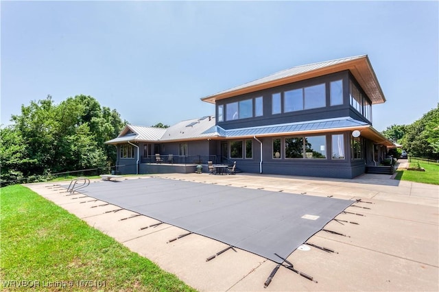 4001 Spring Mountain Rd, Fort Smith, AR 72916 - back of house featuring a patio and a covered pool