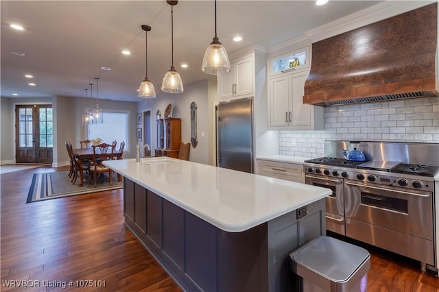 4001 Spring Mountain Rd, Fort Smith, AR 72916 - kitchen featuring premium range hood, decorative backsplash, high quality appliances, and a kitchen island with sink
