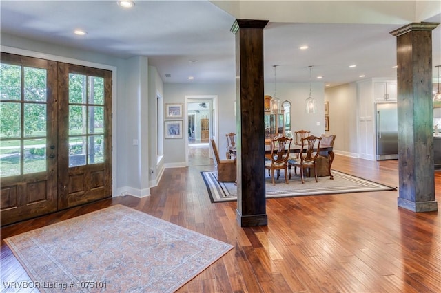 4001 Spring Mountain Rd, Fort Smith, AR 72916 - foyer featuring decorative columns, french doors, and dark wood-type flooring