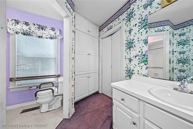 19 Hiland Dr, Fort Smith, AR 72901 - bathroom with wallpapered walls, vanity, and a closet