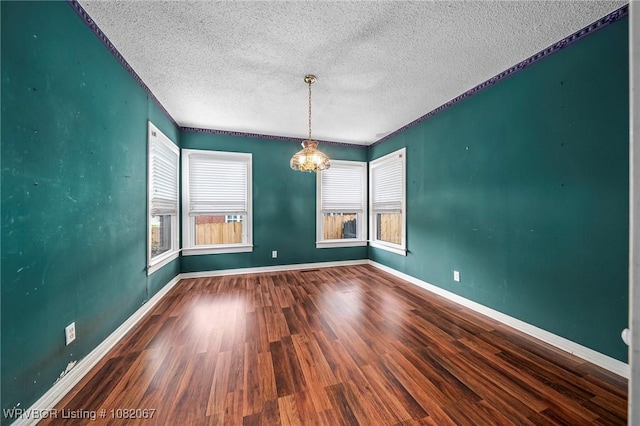 19 Hiland Dr, Fort Smith, AR 72901 - unfurnished room with a chandelier, a textured ceiling, and wood finished floors