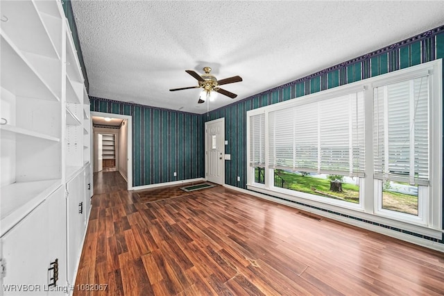 19 Hiland Dr, Fort Smith, AR 72901 - empty room with wood finished floors, a textured ceiling, and ceiling fan