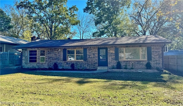 ranch-style house with a front lawn