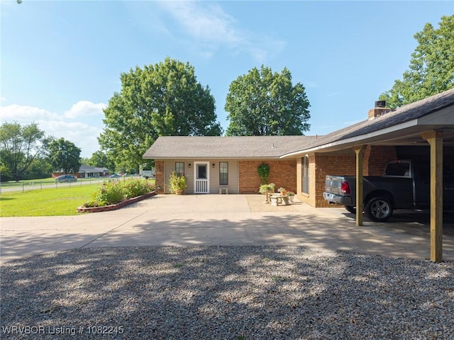 309 Neal Dr, Roland, OK 74954 - ranch-style home with brick siding and a chimney