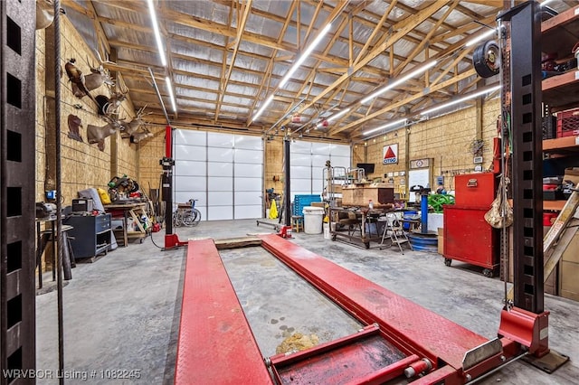 309 Neal Dr, Roland, OK 74954 - garage with a workshop area
