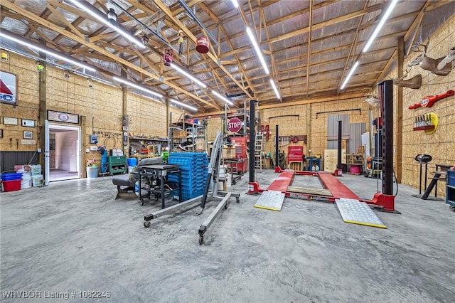 309 Neal Dr, Roland, OK 74954 - garage featuring a workshop area