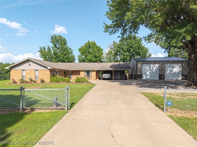 309 Neal Dr, Roland, OK 74954 - view of front facade featuring a carport, concrete driveway, and brick siding