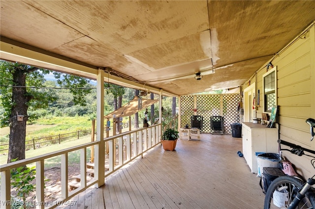 wooden deck featuring a porch