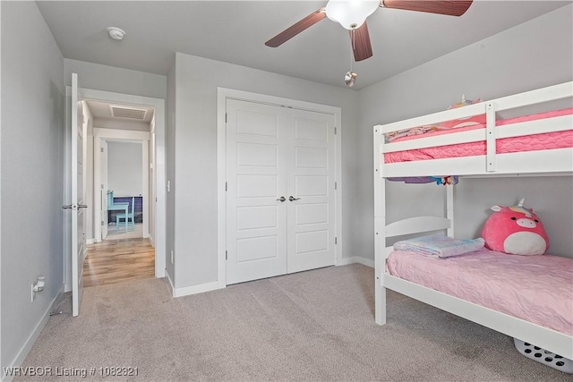 1228 Bradley St, Centerton, AR 72719 - carpeted bedroom featuring a closet and ceiling fan
