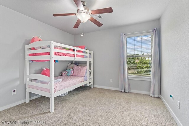 1228 Bradley St, Centerton, AR 72719 - bedroom featuring carpet floors and a ceiling fan