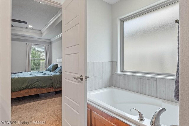 1228 Bradley St, Centerton, AR 72719 - bathroom with crown molding, ensuite bathroom, and a tub with jets