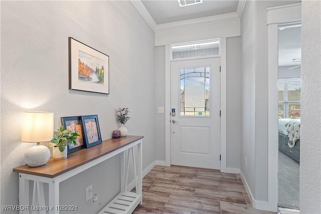 1228 Bradley St, Centerton, AR 72719 - foyer featuring crown molding and baseboards