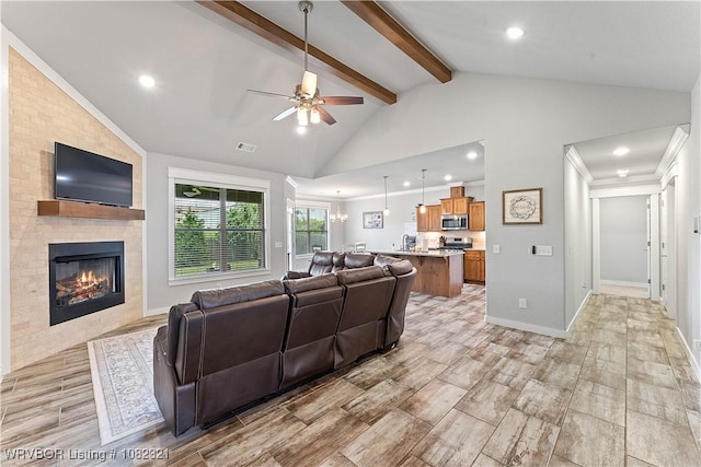 1228 Bradley St, Centerton, AR 72719 - living area featuring a ceiling fan, a fireplace, recessed lighting, and light wood-style flooring