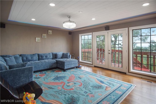 3417 Royal Scots Way, Fort Smith, AR 72908 - living room with healthy amount of natural light, wood finished floors, recessed lighting, and french doors