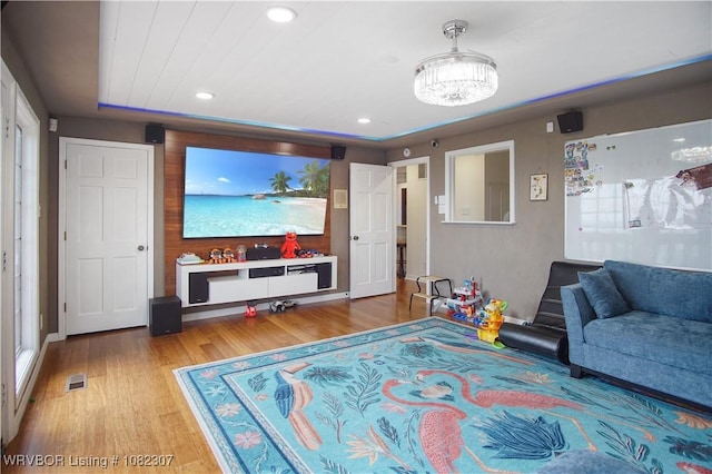 3417 Royal Scots Way, Fort Smith, AR 72908 - living area featuring wood finished floors, plenty of natural light, a chandelier, and recessed lighting