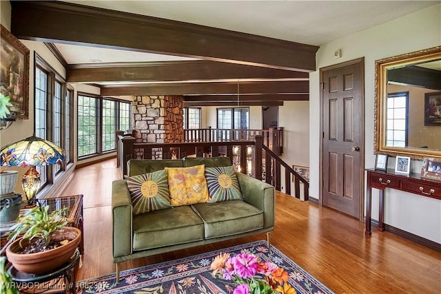 3417 Royal Scots Way, Fort Smith, AR 72908 - living room featuring wood finished floors, plenty of natural light, and beamed ceiling