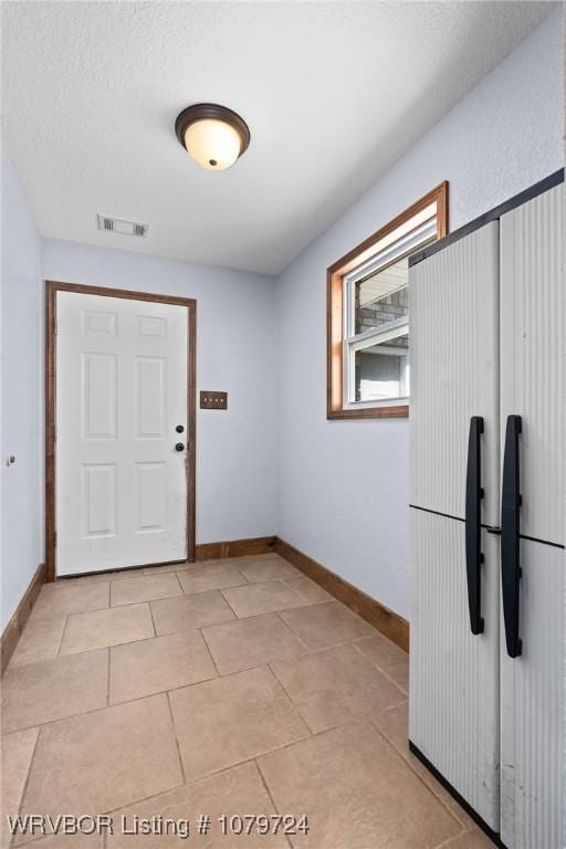 2702 Rambo Cir, Lavaca, AR 72941 - foyer with light tile patterned floors
