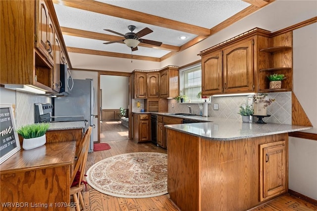 kitchen featuring brown cabinetry, hardwood / wood-style floors, a peninsula, open shelves, and beam ceiling