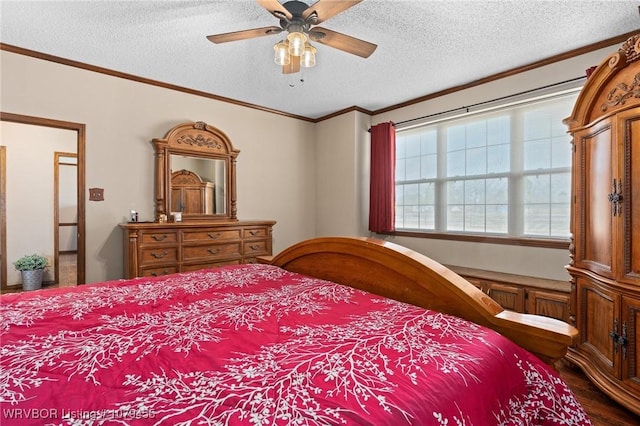 bedroom with a ceiling fan, crown molding, a textured ceiling, and wood finished floors