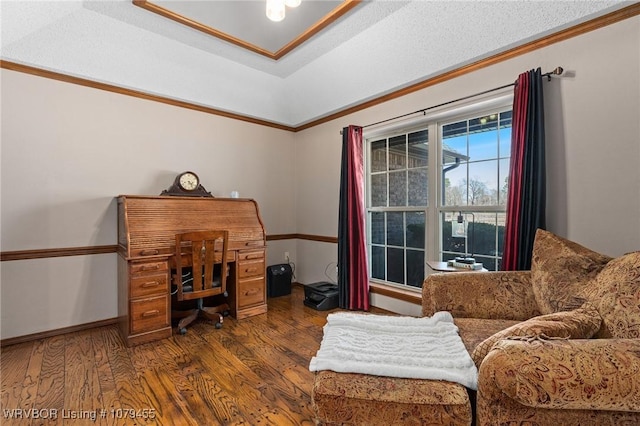 office featuring ornamental molding, baseboards, and wood finished floors