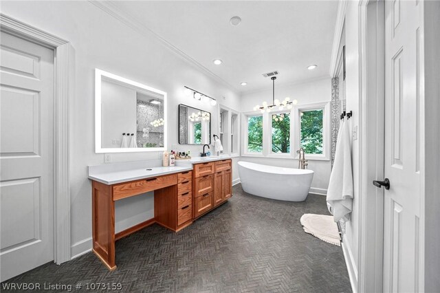 10101 Stephens Ct, Fort Smith, AR 72908 - bathroom featuring double vanity, a soaking tub, a chandelier, ornamental molding, and recessed lighting