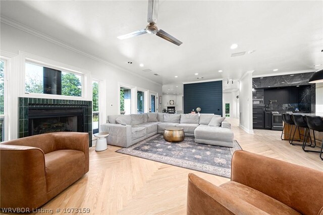 10101 Stephens Ct, Fort Smith, AR 72908 - living room featuring a fireplace, a ceiling fan, crown molding, and recessed lighting