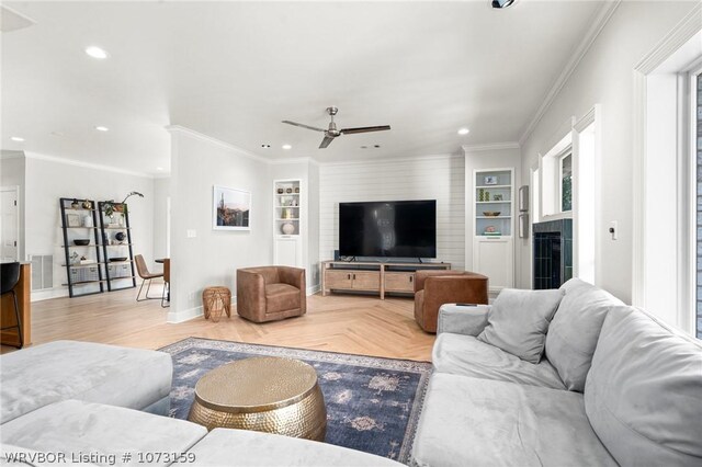 10101 Stephens Ct, Fort Smith, AR 72908 - living area featuring recessed lighting, a ceiling fan, built in shelves, crown molding, and parquet flooring