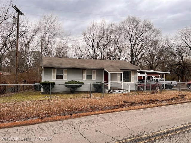 view of front facade with a carport