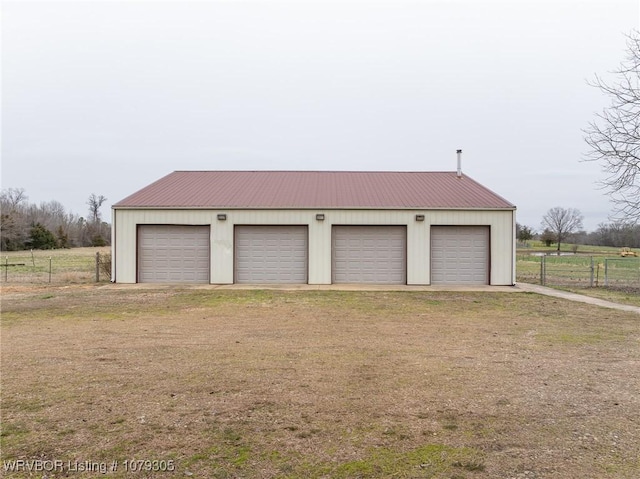 detached garage with fence