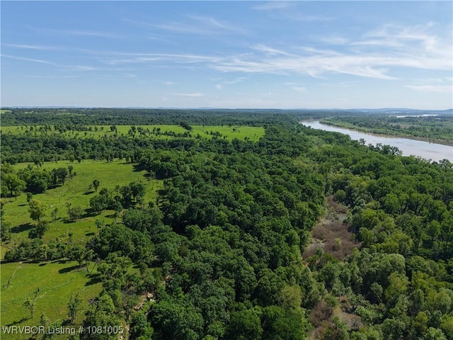 20309 E County Road 1110, Stigler, OK 74462 - aerial view of a forest and a nearby body of water