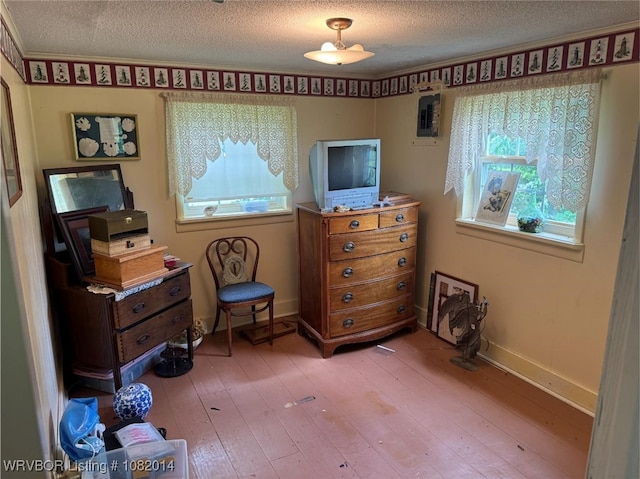 106 E Cedar St, Hackett, AR 72937 - bedroom with a textured ceiling and wood-type flooring