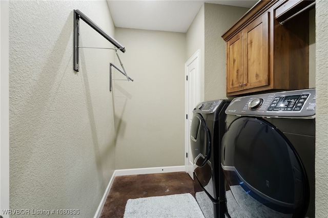 8205 Cisterna Way, Fort Smith, AR 72916 - laundry area with cabinet space, separate washer and dryer, baseboards, and a textured wall