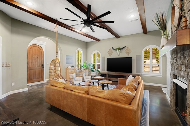 8205 Cisterna Way, Fort Smith, AR 72916 - living area with concrete floors, beam ceiling, baseboards, and a fireplace