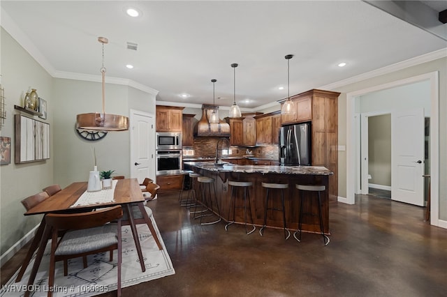 8205 Cisterna Way, Fort Smith, AR 72916 - kitchen featuring stainless steel appliances, tasteful backsplash, concrete flooring, recessed lighting, and baseboards