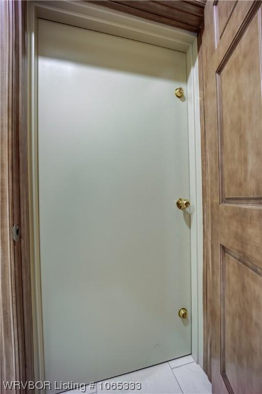 bathroom with tile patterned floors