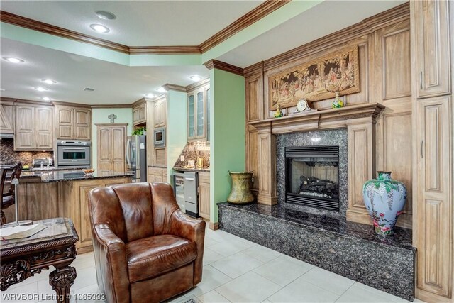 tiled living room featuring a fireplace and crown molding