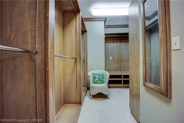 spacious closet with light tile patterned flooring