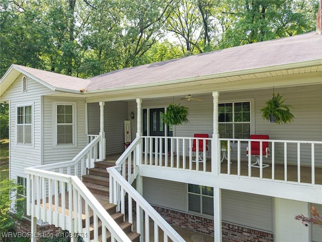 3009 Shadow Lake Dr, Greenwood, AR 72936 - exterior space featuring ceiling fan, covered porch, brick siding, a shingled roof, and stairway