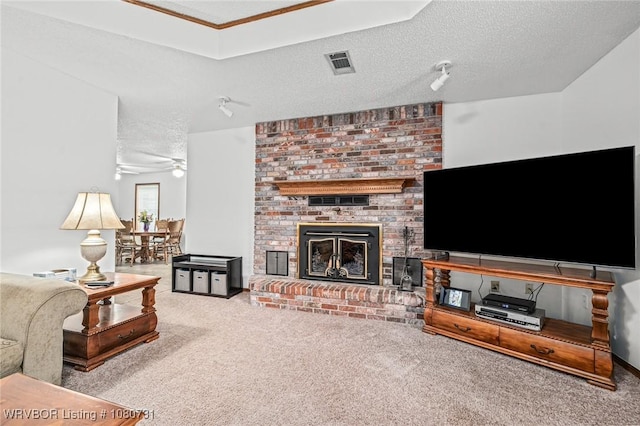 3009 Shadow Lake Dr, Greenwood, AR 72936 - living room with carpet floors, ceiling fan, a brick fireplace, and visible vents