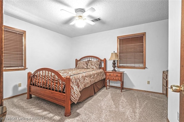 3009 Shadow Lake Dr, Greenwood, AR 72936 - carpeted bedroom featuring visible vents, a textured ceiling, and baseboards