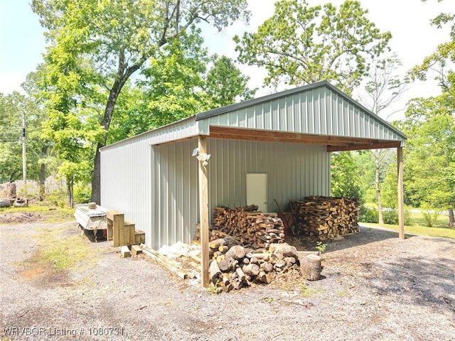 3009 Shadow Lake Dr, Greenwood, AR 72936 - view of property exterior with a pole building and an outdoor structure