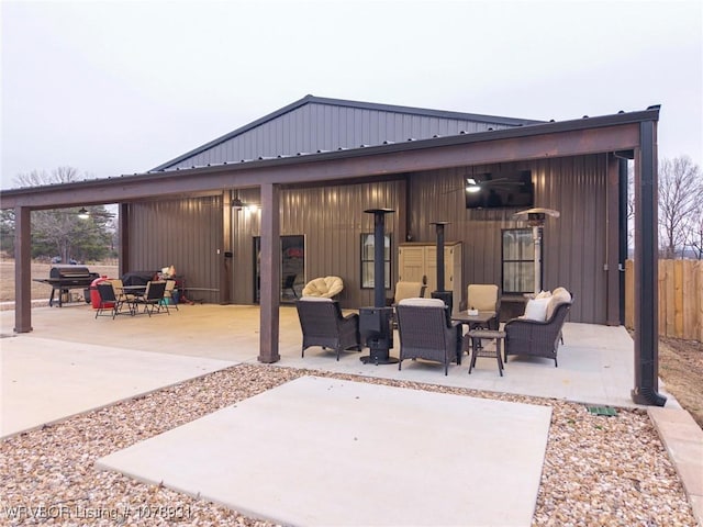 view of patio with a grill and an outdoor hangout area