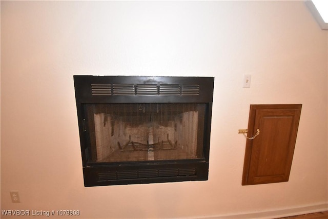 interior details featuring a fireplace