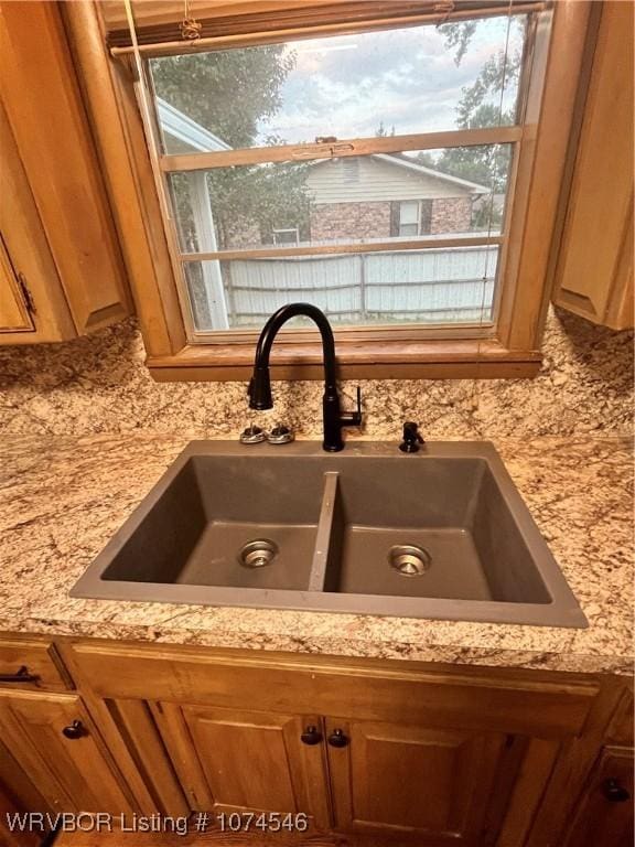 details with light stone counters and sink