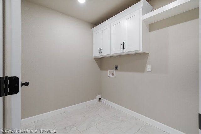 laundry area featuring electric dryer hookup, cabinets, and hookup for a washing machine