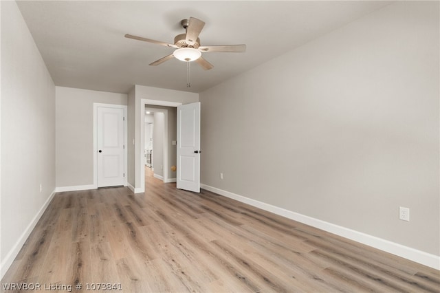 unfurnished bedroom with ceiling fan and light hardwood / wood-style floors